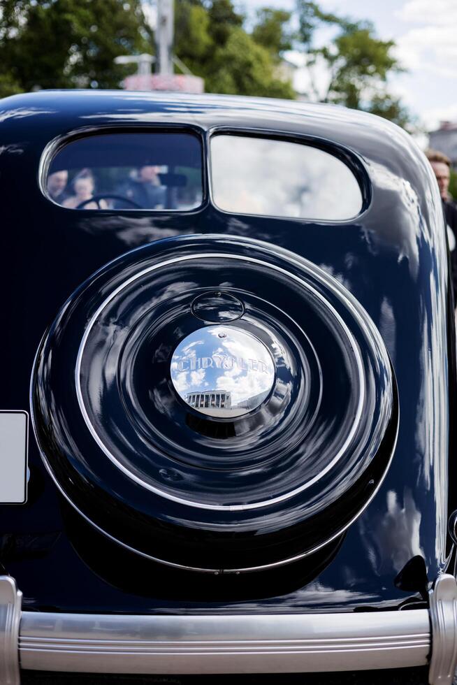 Minsk, Belarus, May 16, 2024 - Rear view black retro car Chrysler Airflow photo