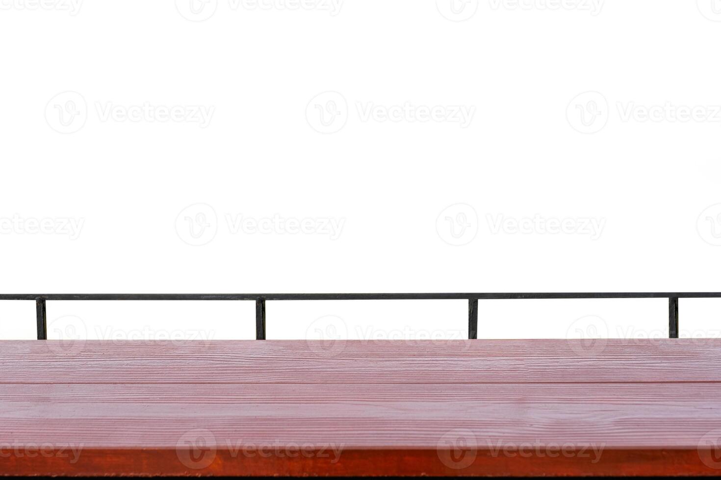 Wooden table top with metallic rail on white background photo