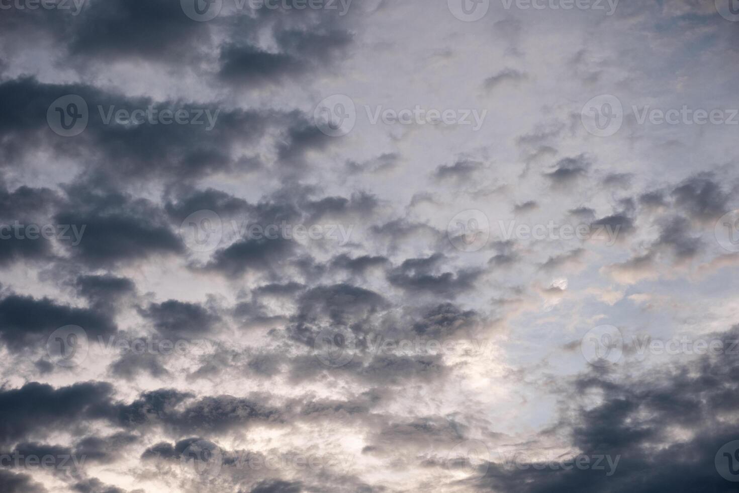 Cluster fluff cloudy on blue sky at sunset photo