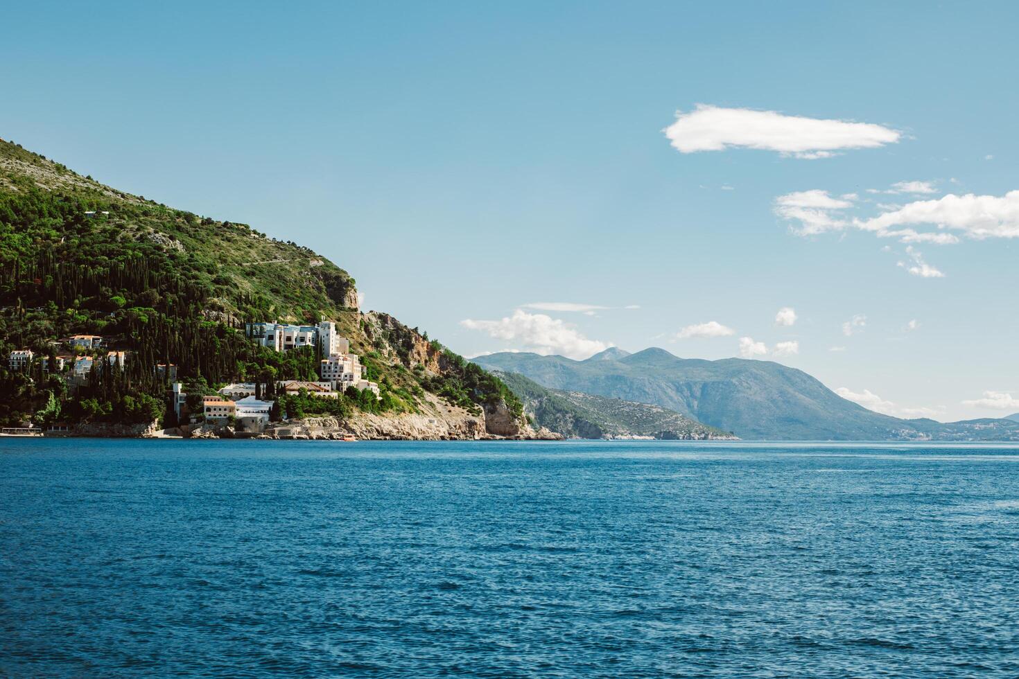 Amazing view of Dubrovnik and the sea in a sunny day. Travel destination in Croatia. photo