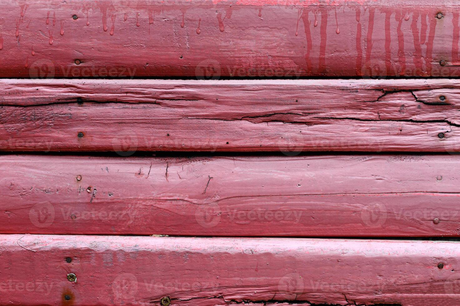 Aged cracked of red wooden timber wall texture photo