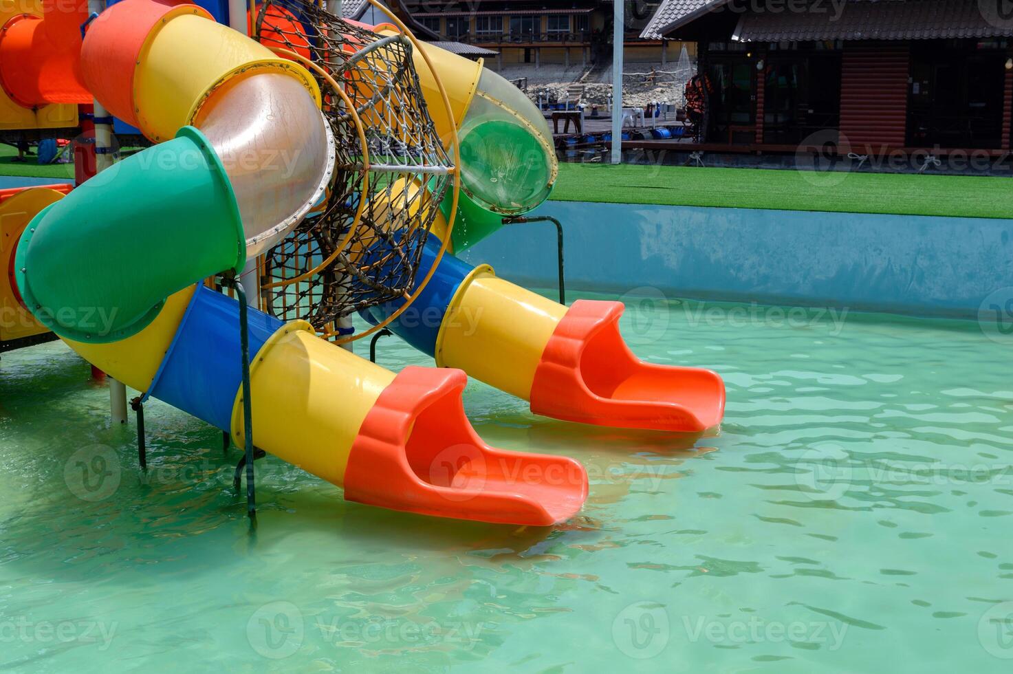 Colorful slider childhood of amusement waterpark photo