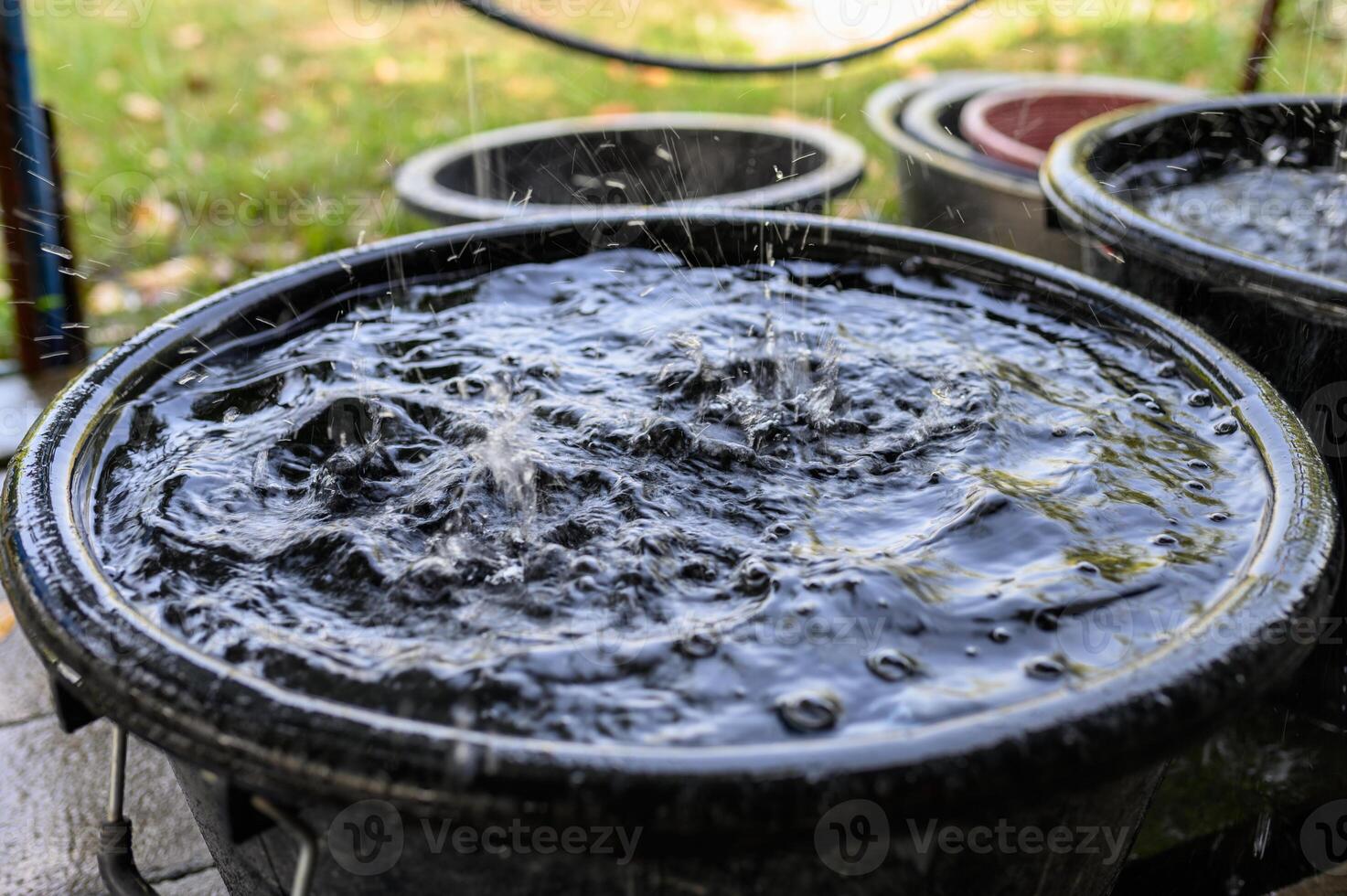 Water falling with splashing in receive bucket photo
