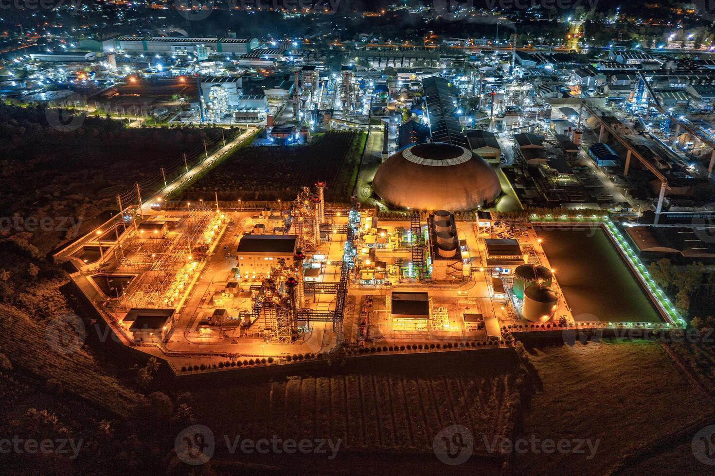 Electric power plant substation illumination, Export-oriented manufacturing paper packaging and corrugated industry at night photo