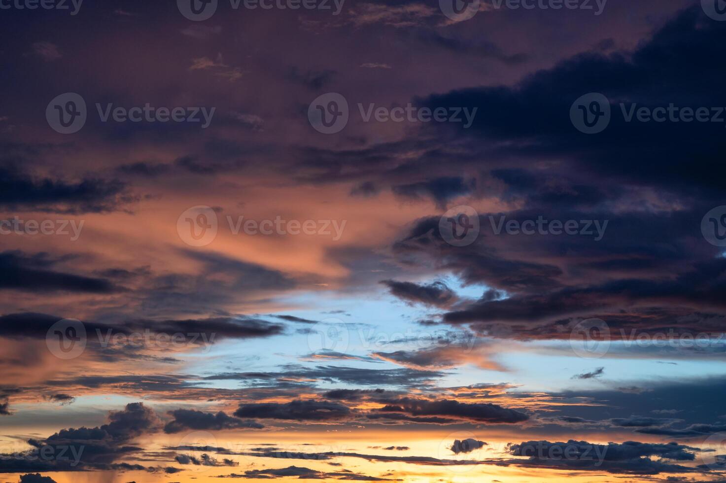 Dramatic sunset clouds in the sky photo