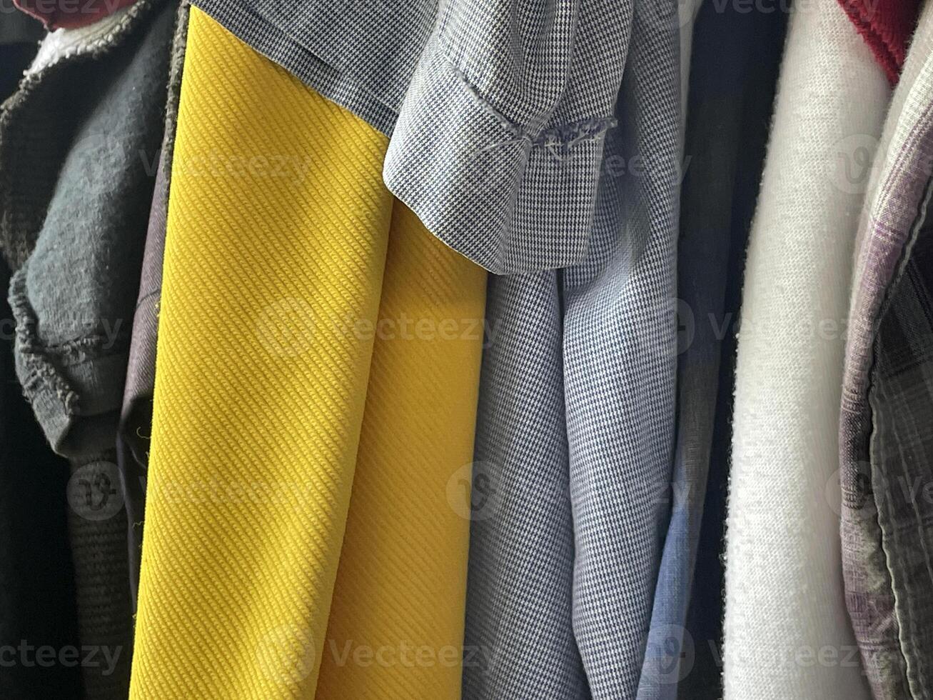 stack of different shirts photo