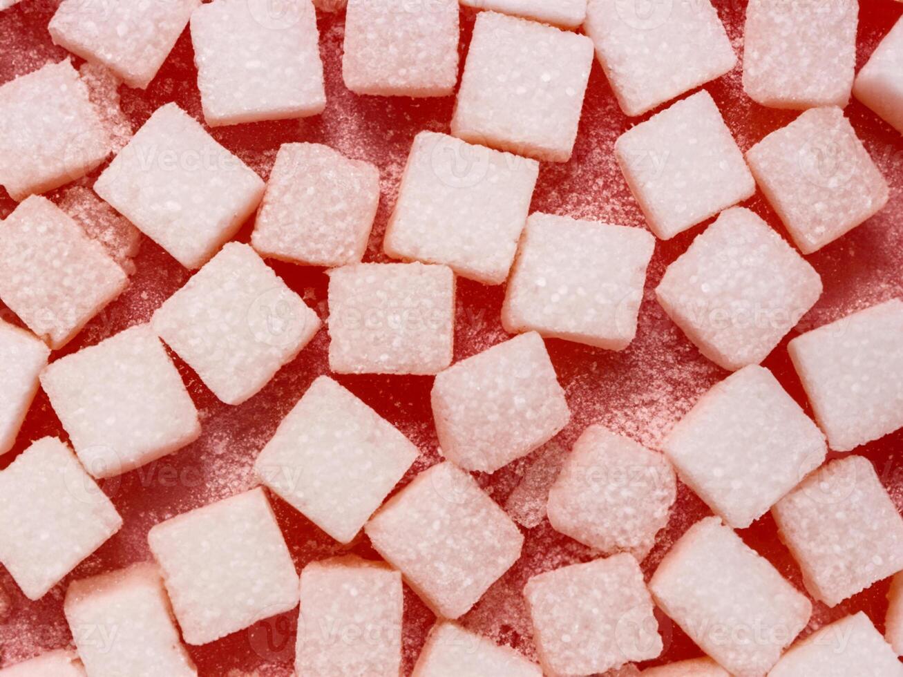 pile of white sugar on red floor photo