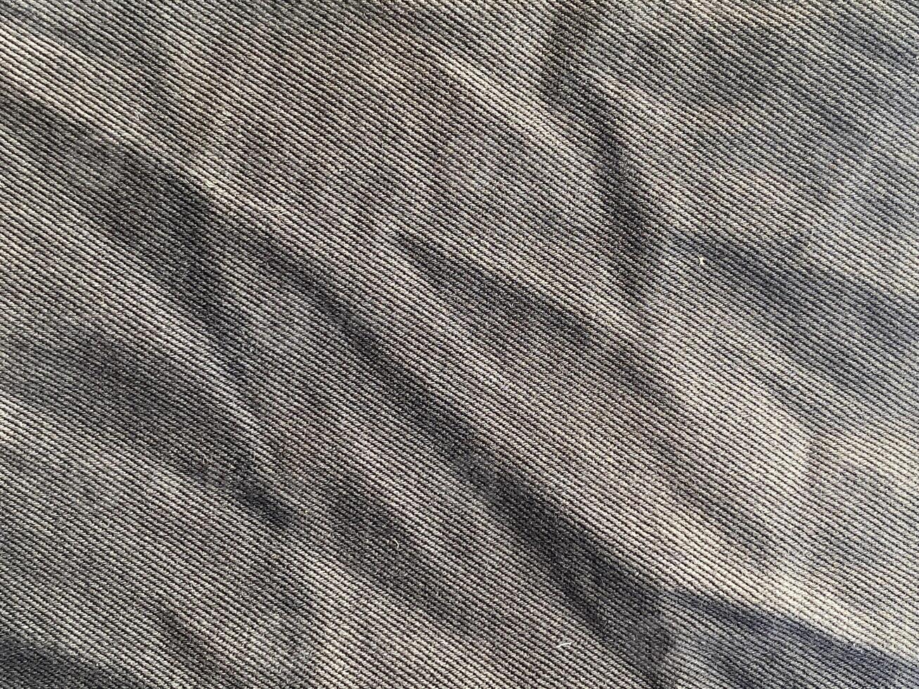 black fabric cloth background. empty space. top view. photo