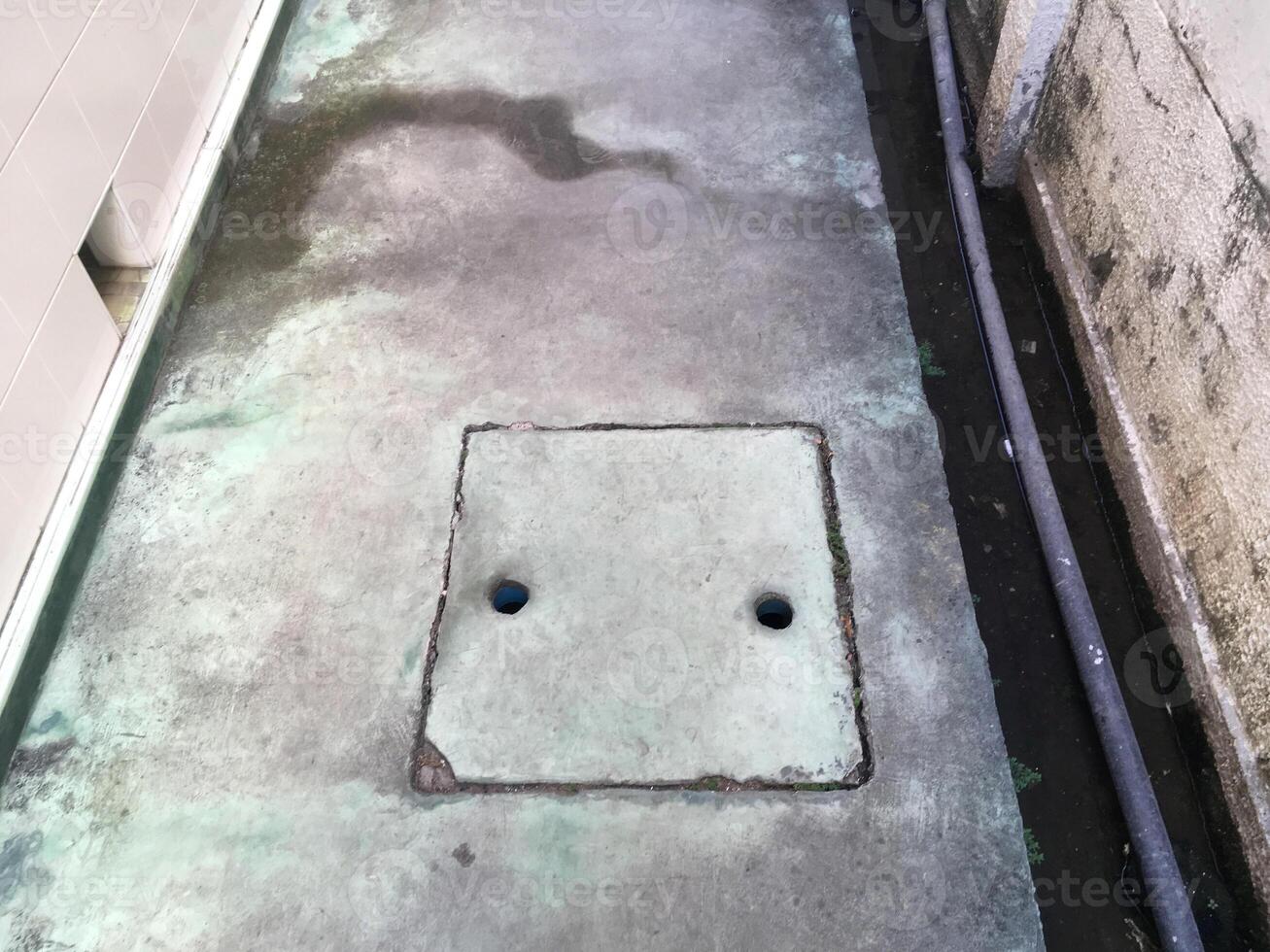 the hole in concrete floor photo
