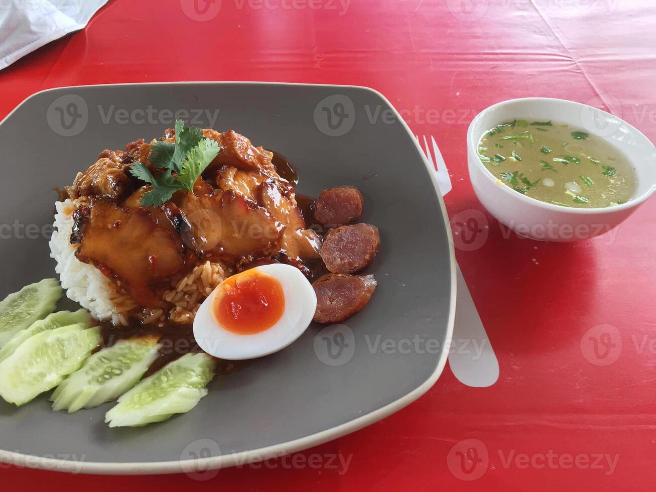red pork and hot rice with red sauce photo