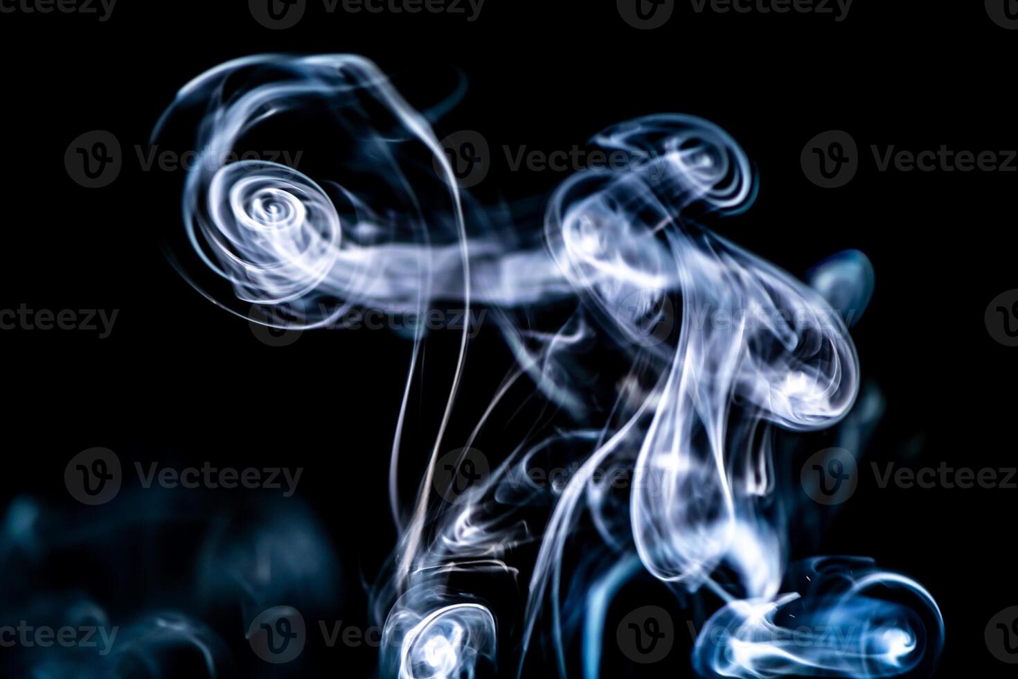 blue smoke, vapor, fog cloud on black background for using in composition and overlay photo