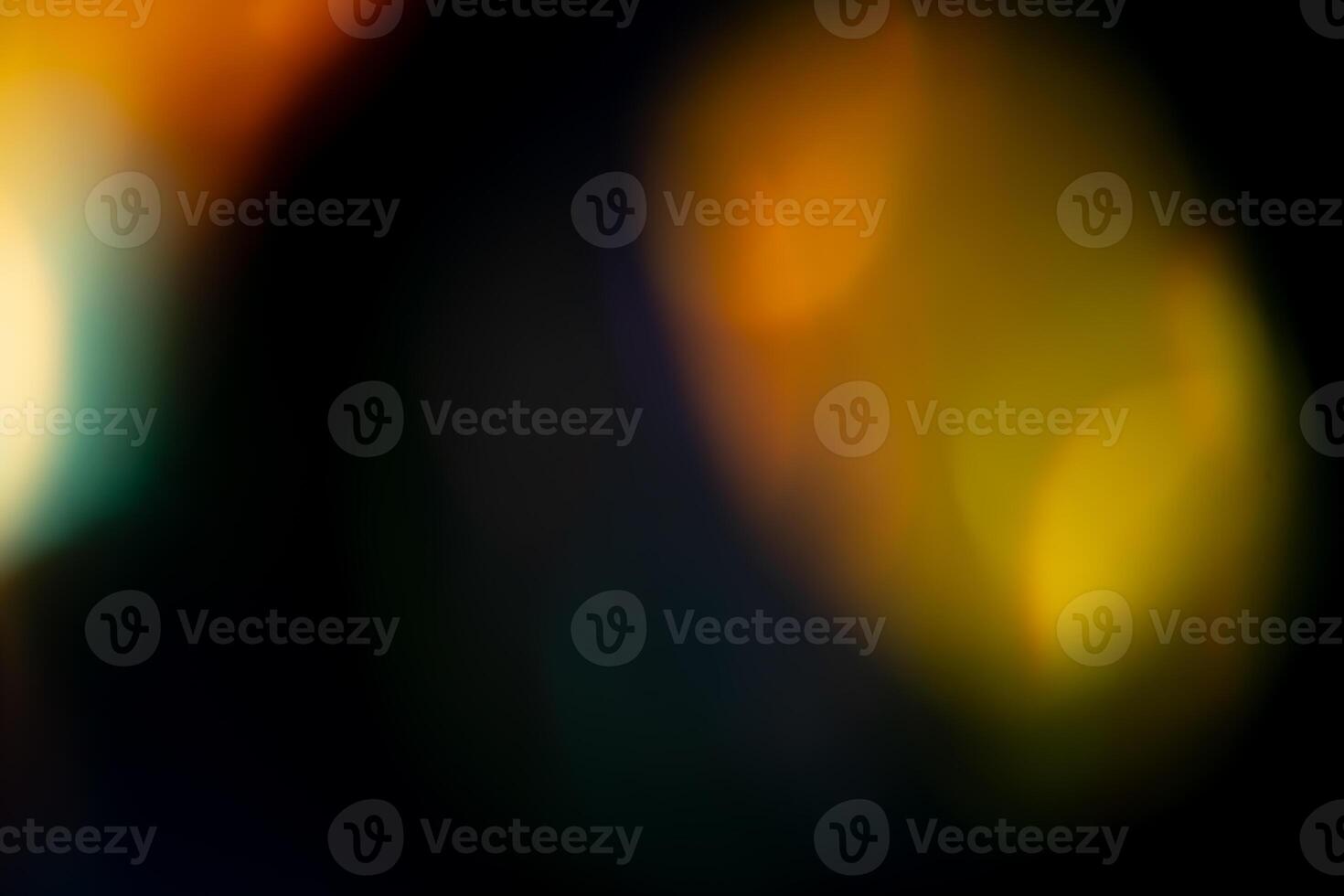 Multicolored highlights on a black background. for overlay to create a festive, vibrant effect photo