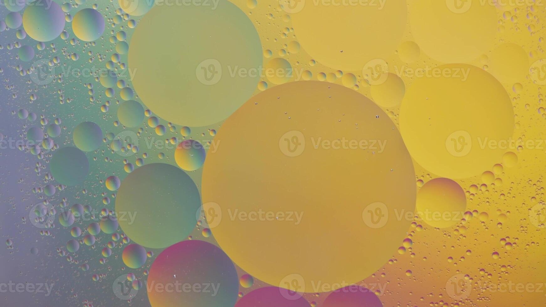 Abstract yellow and green colorful background with oil on water surface. Oil drops in water abstract psychedelic, abstract image. photo