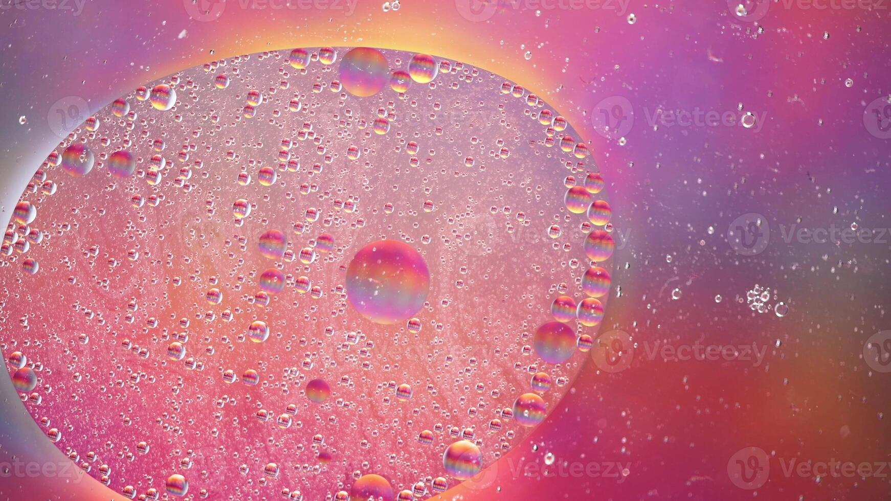 Abstract colorful background with oil on water surface. Oil drops in water abstract psychedelic. photo