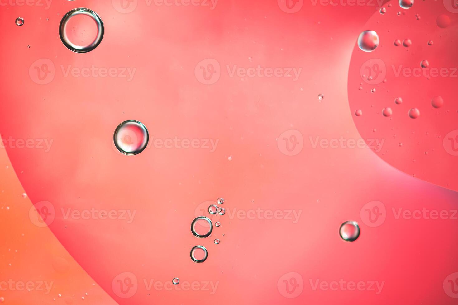 Abstract pink colorful background with oil on water surface. Oil drops in water abstract psychedelic, abstract image. photo