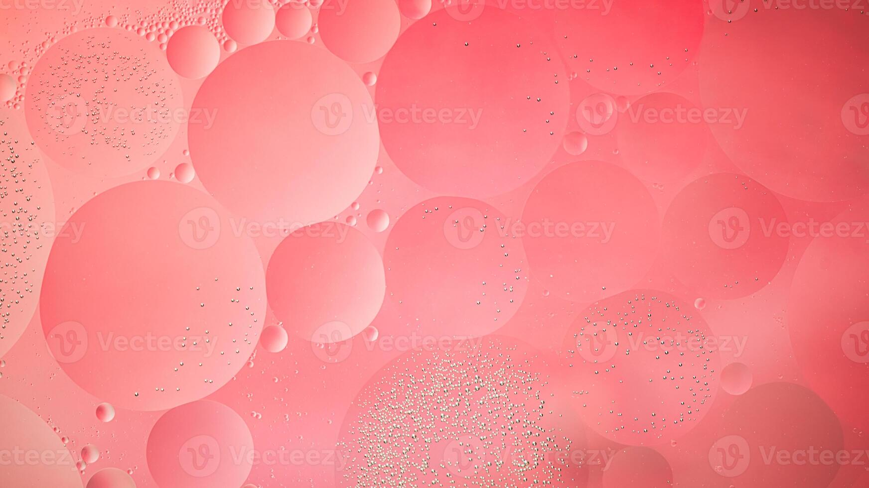 Abstract pink colorful background with oil on water surface. Oil drops in water abstract psychedelic, abstract image. photo