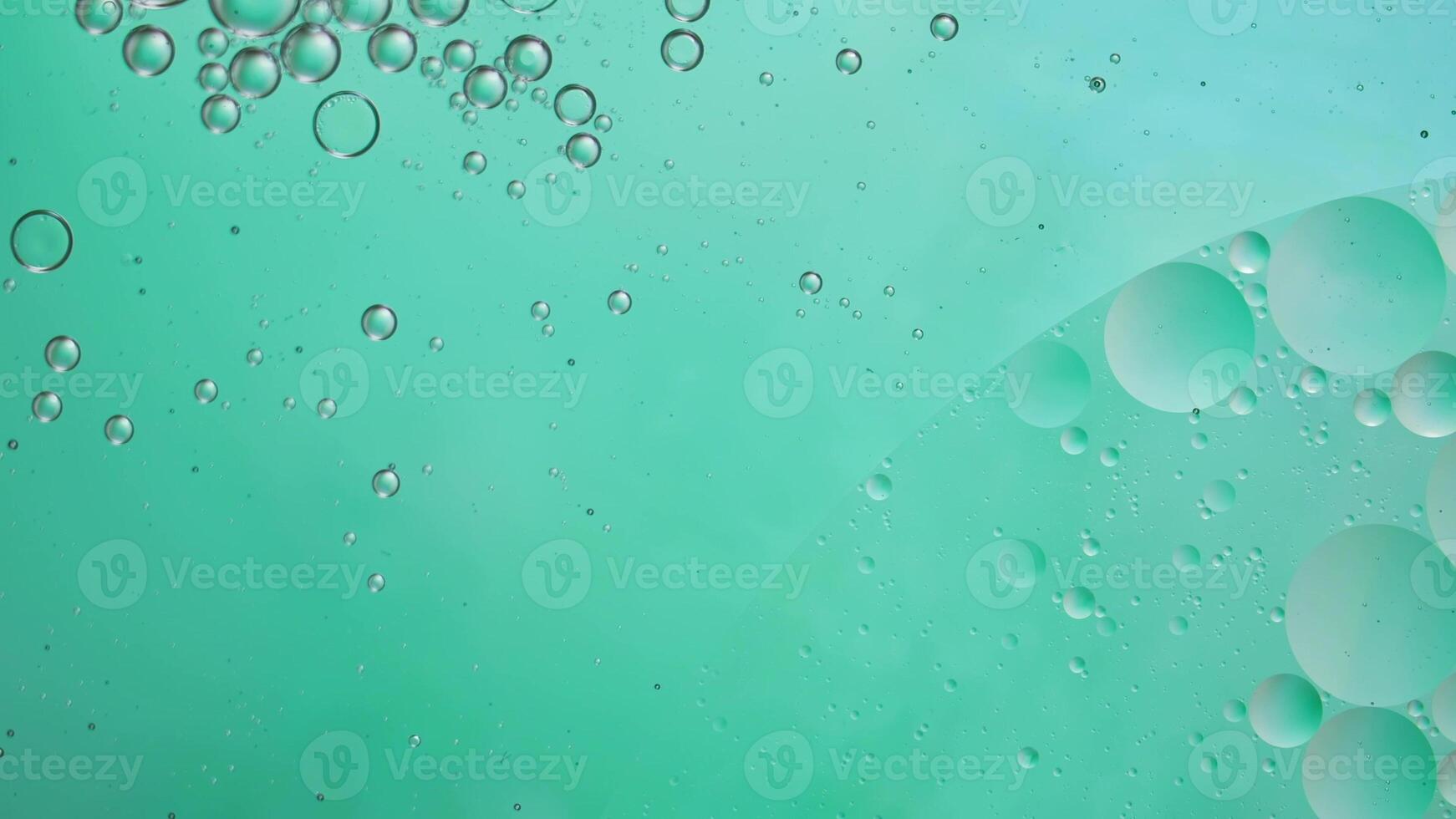 Abstract blue colorful background with oil on water surface. Oil drops in water abstract psychedelic, abstract image. photo