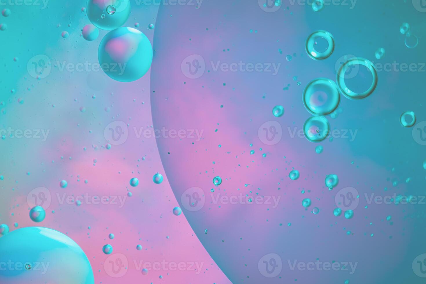 Abstract blue and purple colorful background with oil on water surface. Oil drops in water abstract psychedelic, abstract image. photo