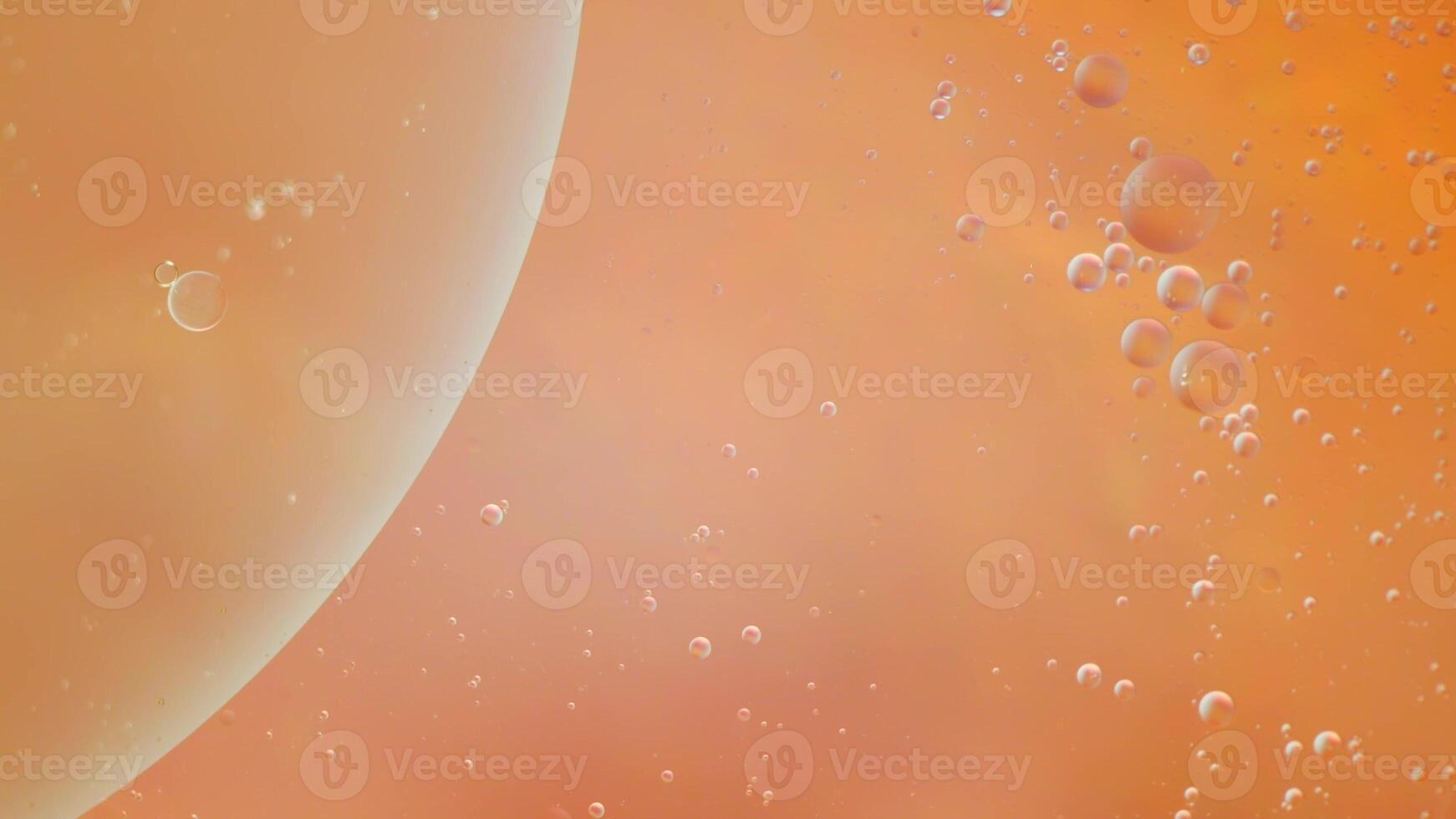 Abstract orange colorful background with oil on water surface. Oil drops in water abstract psychedelic, abstract image. photo