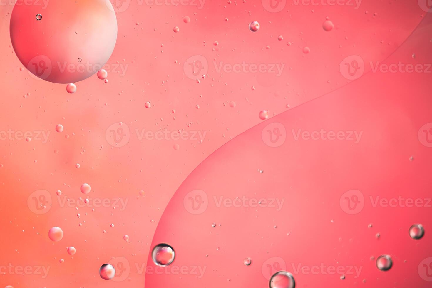 Abstract pink colorful background with oil on water surface. Oil drops in water abstract psychedelic, abstract image. photo