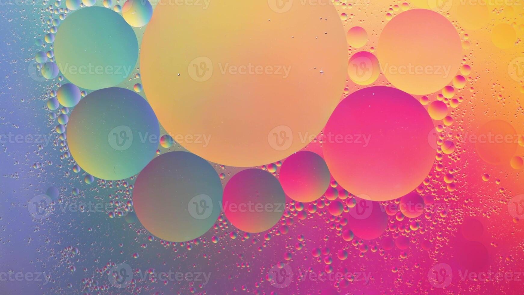 Abstract yellow, green and pink colorful background with oil on water surface. Oil drops in water abstract psychedelic, abstract image. photo
