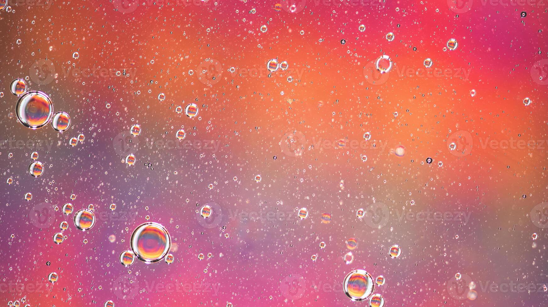 Abstract colorful background with oil on water surface. Oil drops in water abstract psychedelic. photo