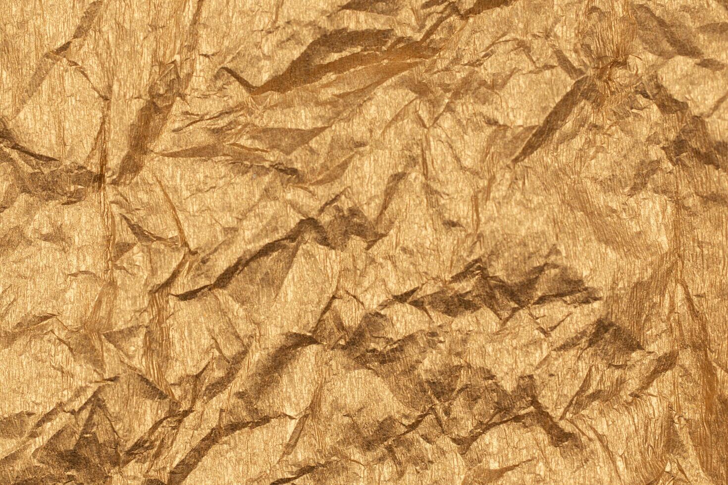 Golden paper texture or background. photo