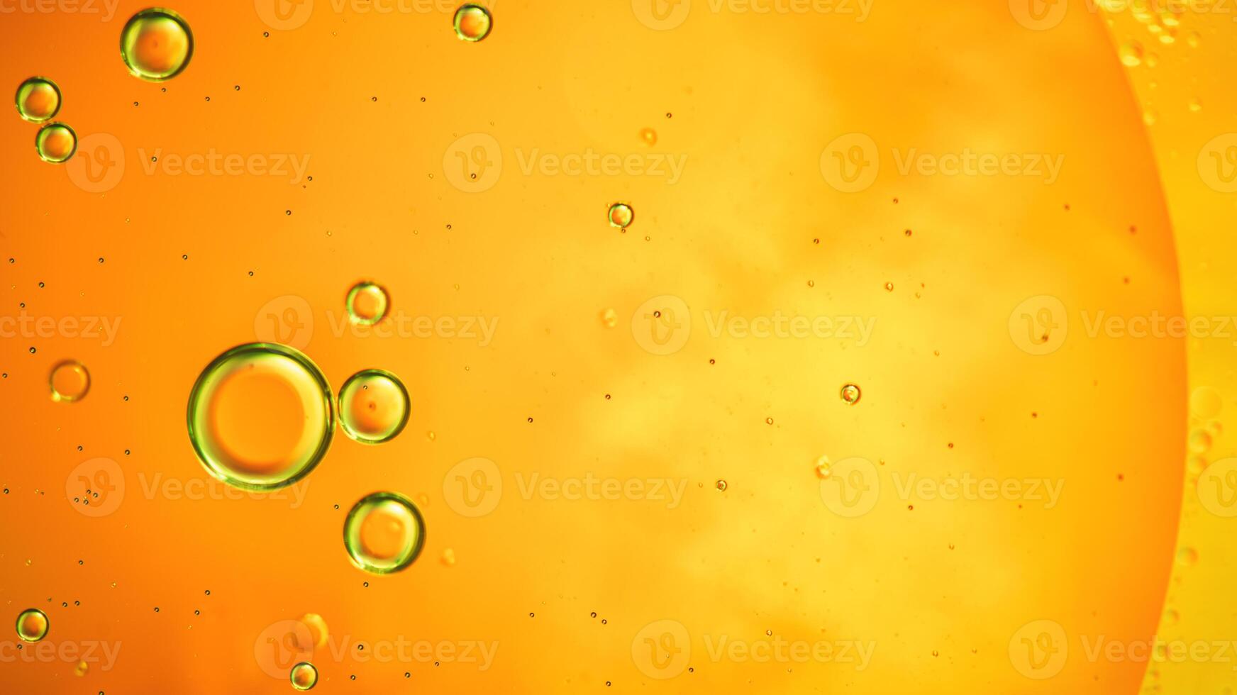 Abstract orange colorful background with oil on water surface. Oil drops in water abstract psychedelic, abstract image. photo