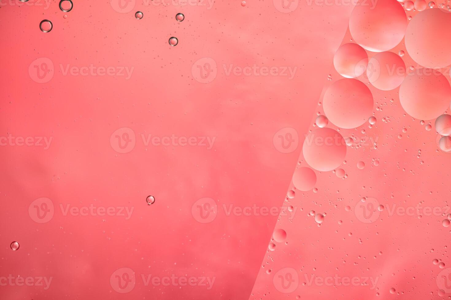 Abstract pink colorful background with oil on water surface. Oil drops in water abstract psychedelic, abstract image. photo