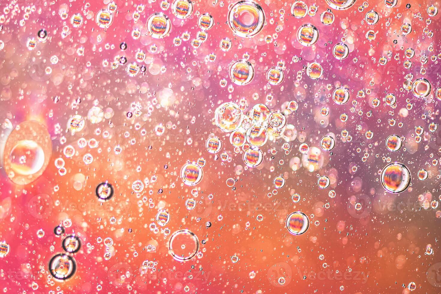 Abstract colorful background with oil on water surface. Oil drops in water abstract psychedelic. photo