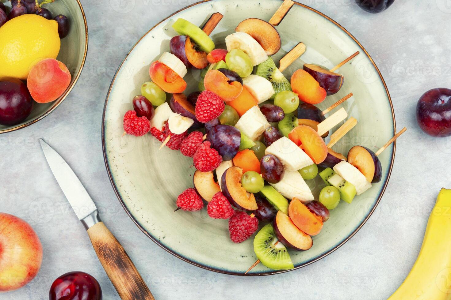 Fruit sweet kebabs. photo