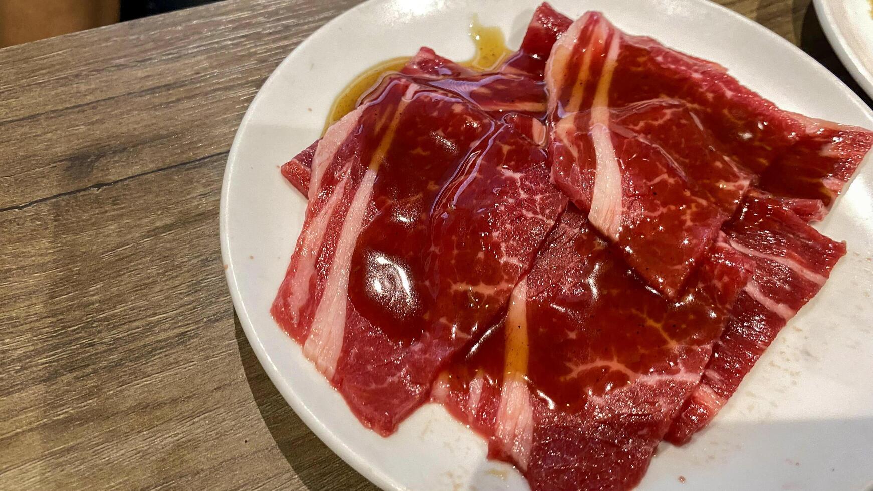 there is a bowl of food with meat and vegetables in it photo