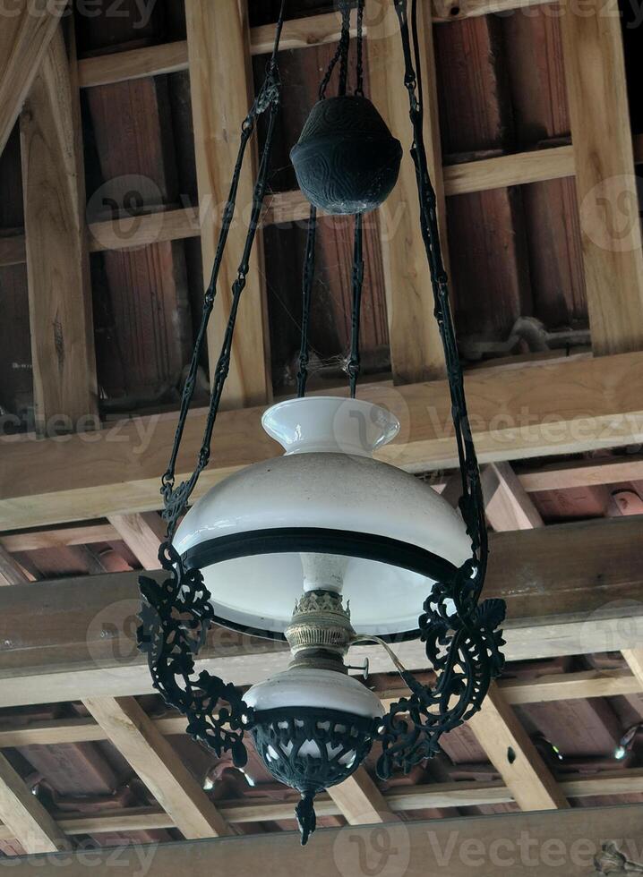 old java hanging ceiling lamp. ancient house decoration. photo
