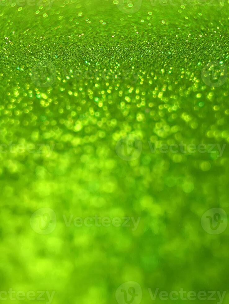 Wrapping paper background with colorful glitter texture. Christmas, New Year festive decoration. Sparkling bright surface photo