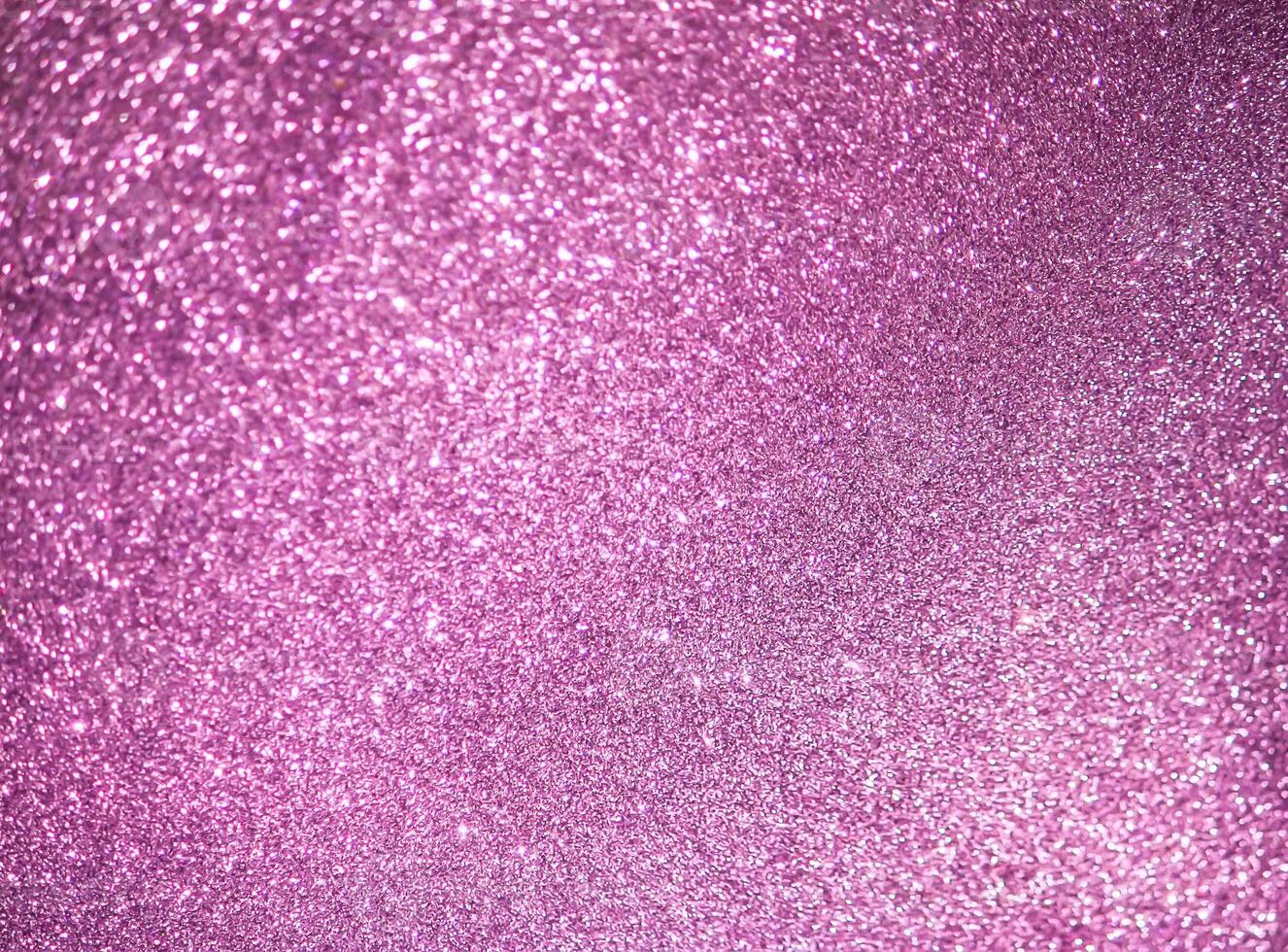 Glitter paper background. Festive sparkle texture. Decorative element for party, birthday, New Year design photo