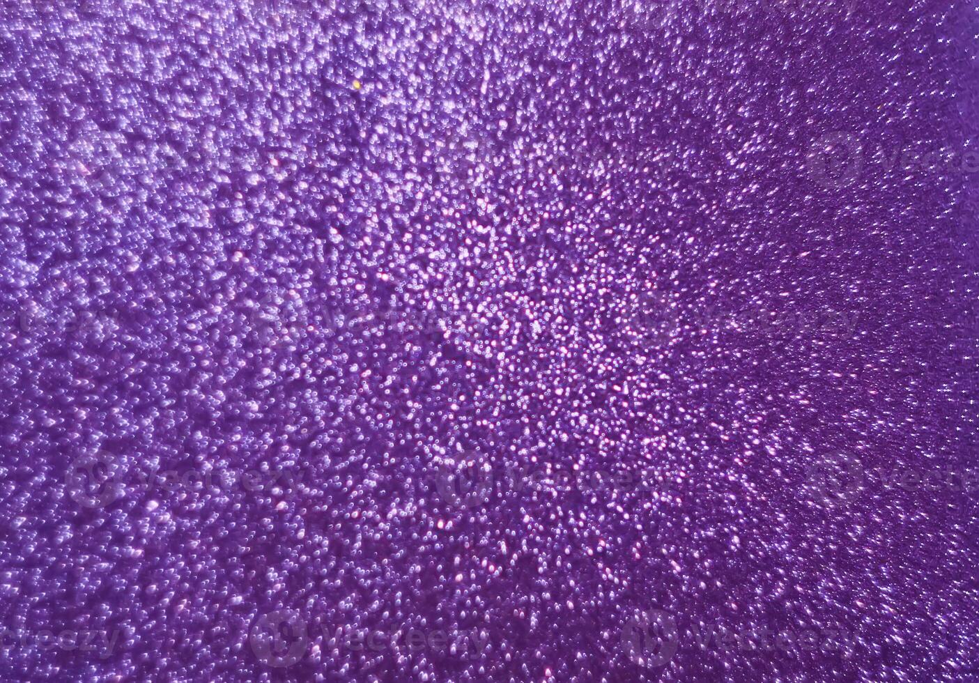 Wrapping paper background with colorful glitter texture. Christmas, New Year festive decoration. Sparkling bright surface photo