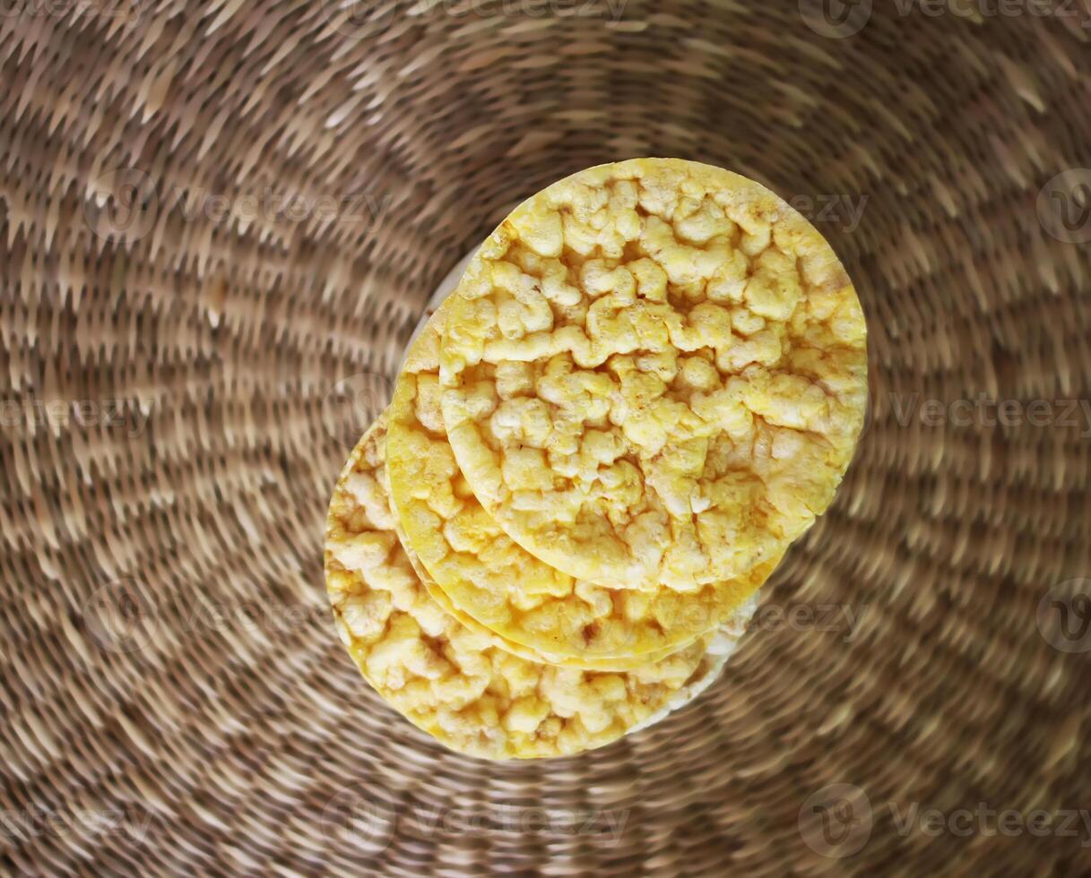 White rice crackers on whicker place mat. photo
