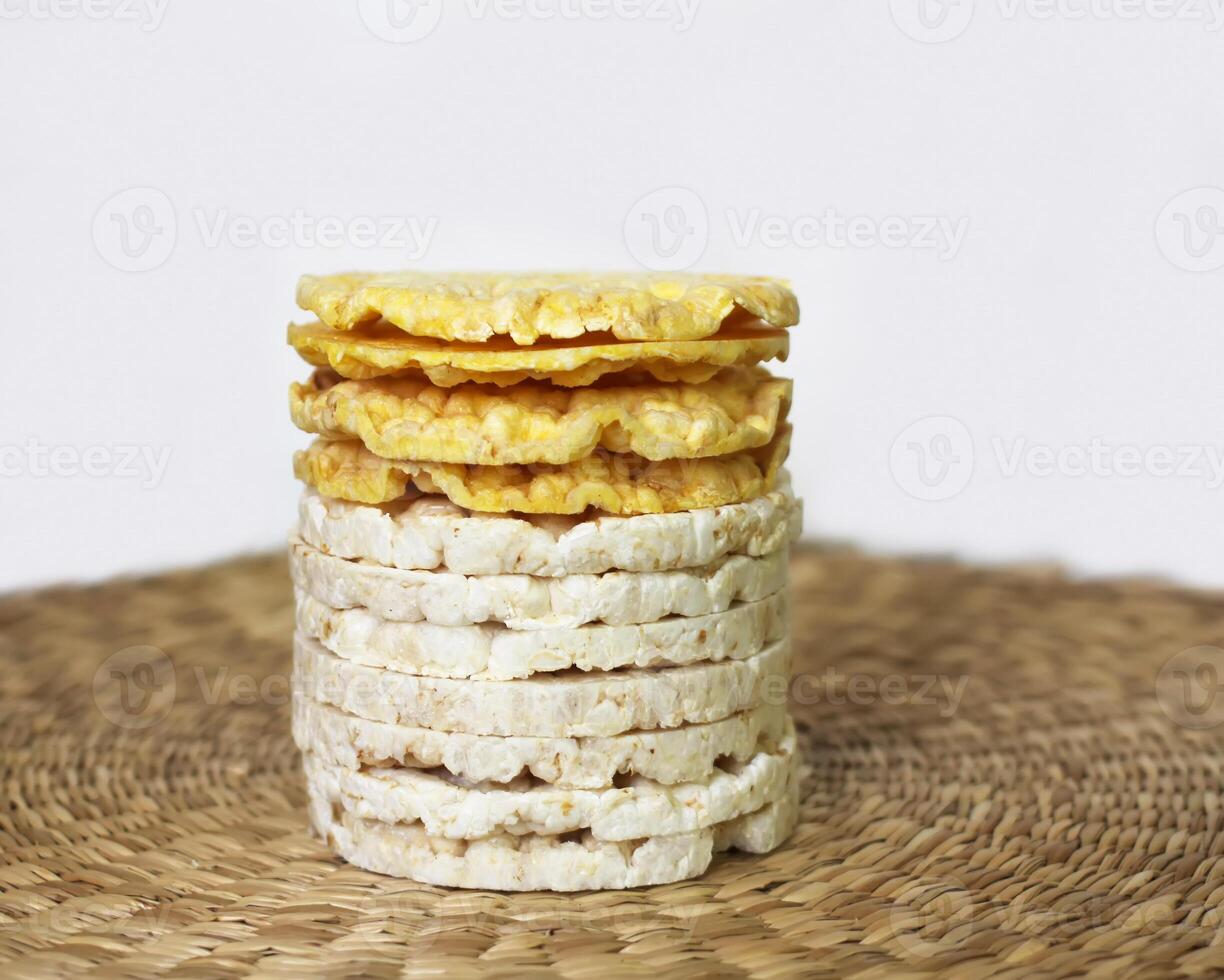 White rice crackers on whicker place mat. photo