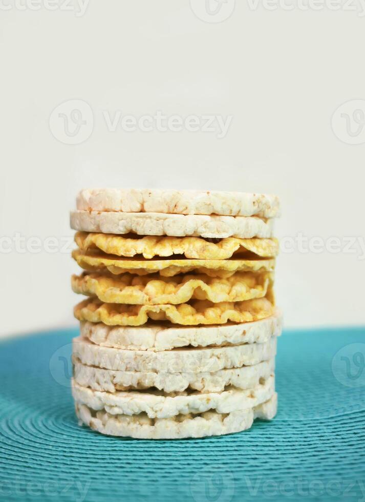 White rice crackers on blue background. photo