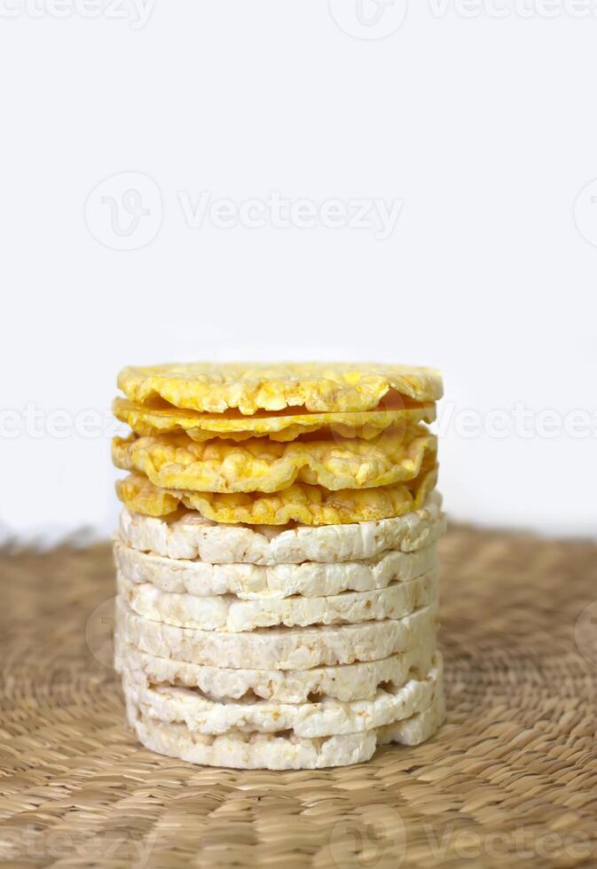 White rice crackers on whicker place mat. photo