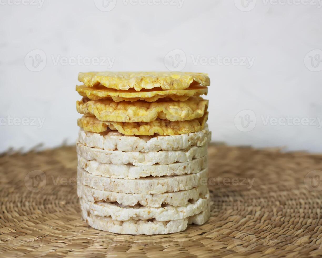 White rice crackers on whicker place mat. photo