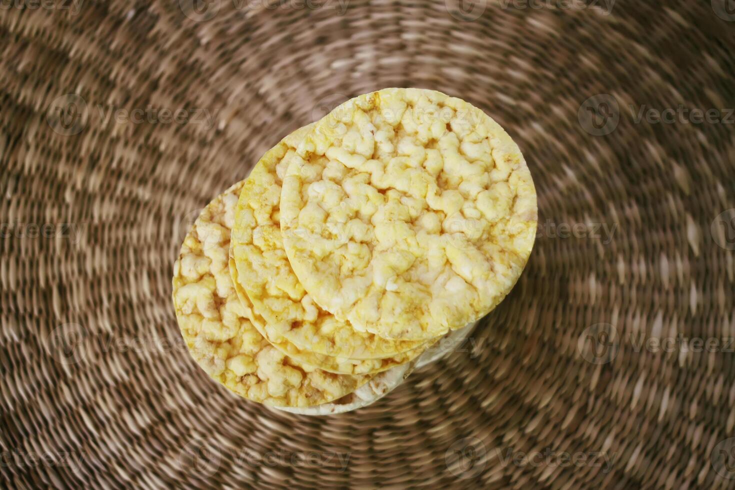 White rice crackers on whicker place mat. photo