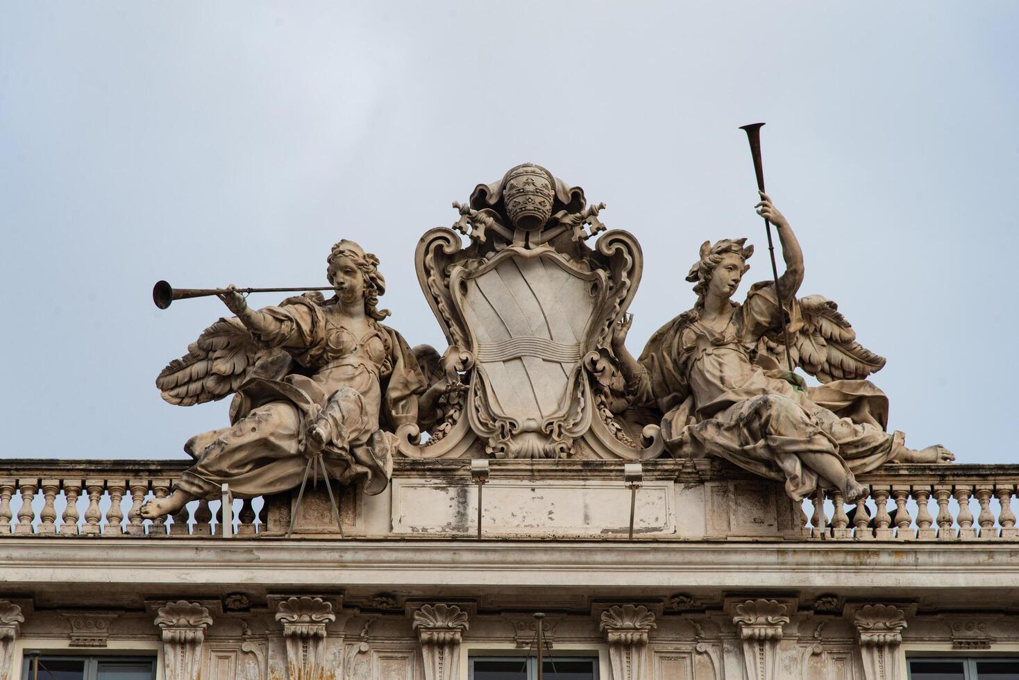 Rome, Italy-April 17, 2024 Sculptures on Palazzo Quirinale, Rome photo