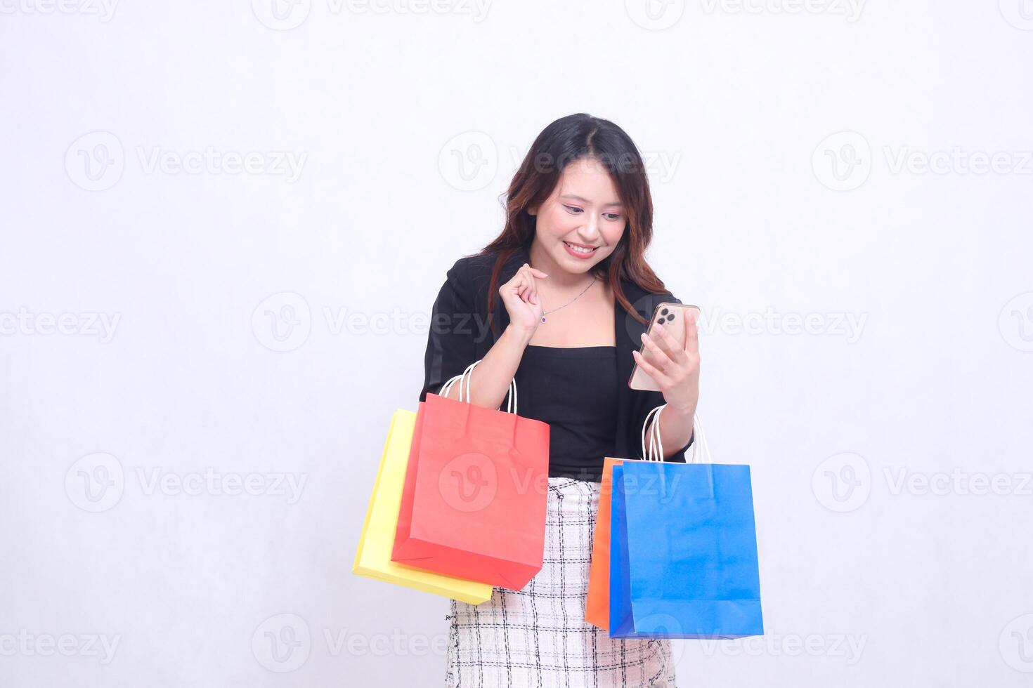 customer beautiful girl asian 20s formal office happy smile left side order via cell phone finished bring shopping paper bag isolated white background photo