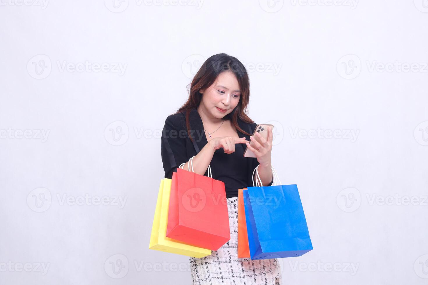 Customer, beautiful Asian girl 20s, formal office, thin smile, oblique to the left, order via cellphone, bring shopping paper bag isolated on white background photo