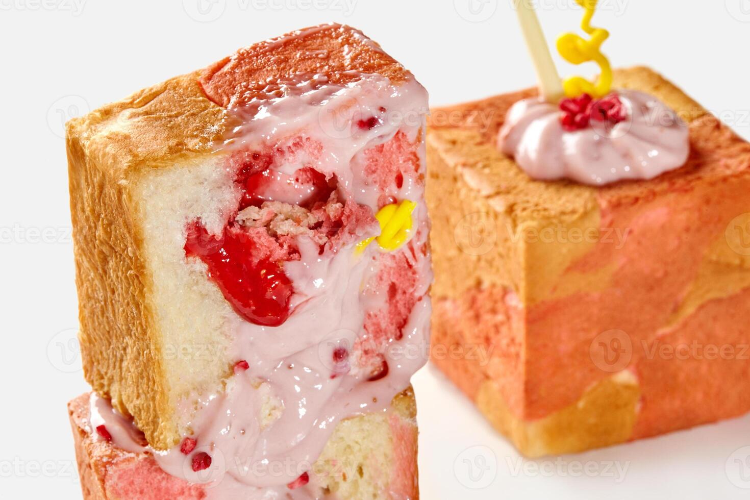 Freshly baked cube shaped croissant with raspberry and cream filling photo