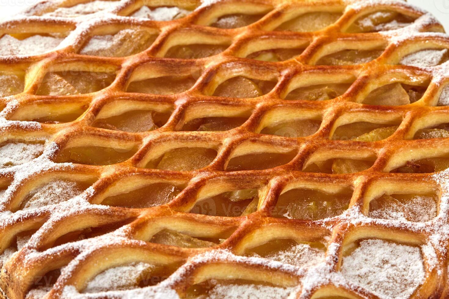 Sweet lattice galette with custard, caramelized apples and sugar dusting photo