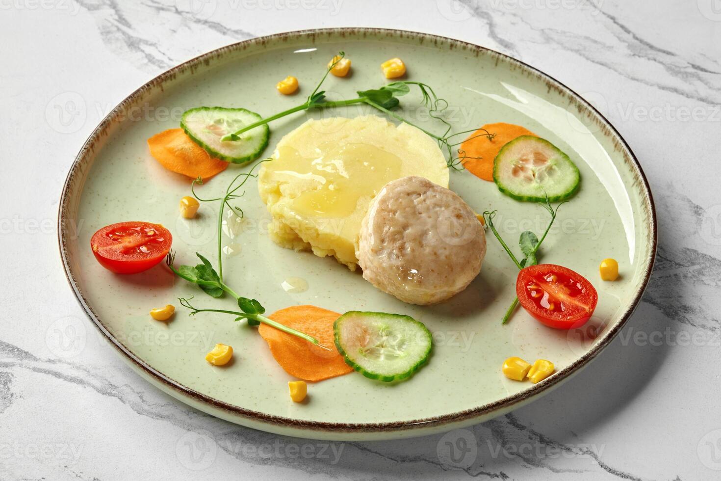 Steamed fish patty with mashed potatoes for kids photo