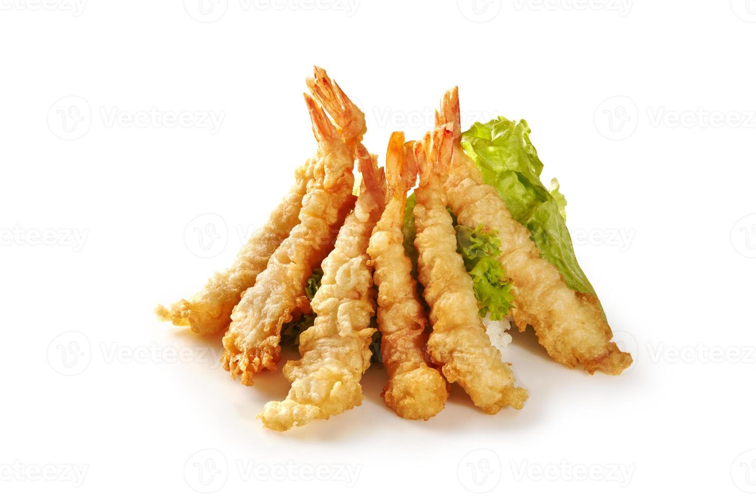 Tempura shrimp teepee with rice and fresh greens on white photo