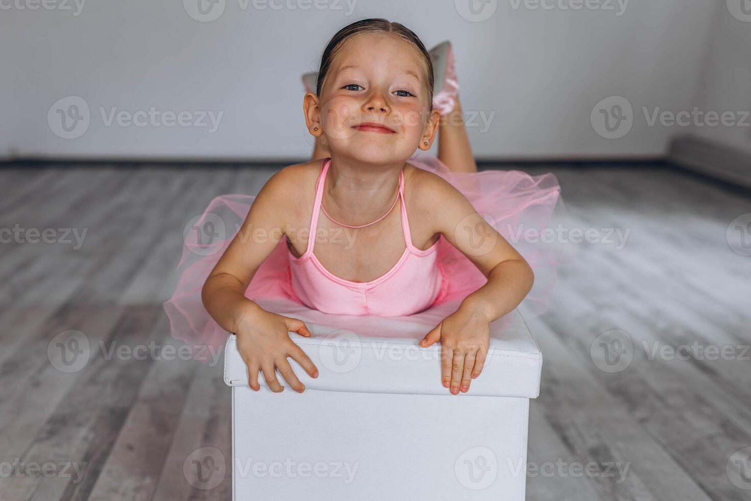 Baby ballet studio. Little ballerina with a coach in dance class. Ballet trainer for children photo